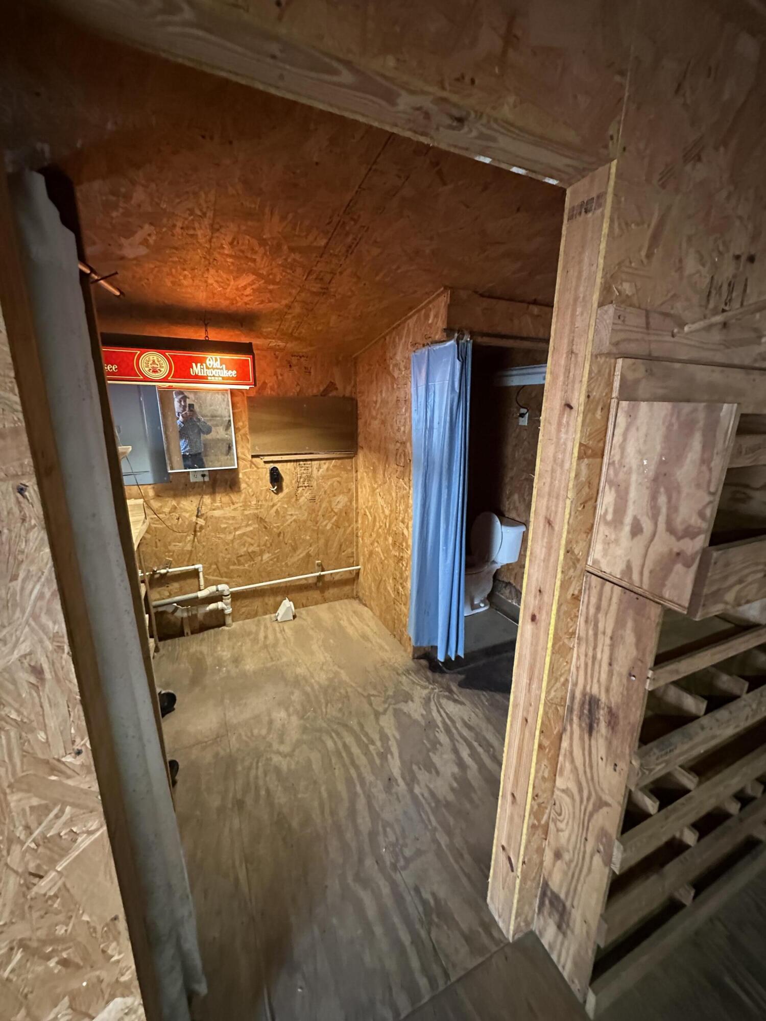 618 Oakridge Road DeFuniak Springs, FL 32433 - Photo 40 of 46 a view of a porch with wooden floor