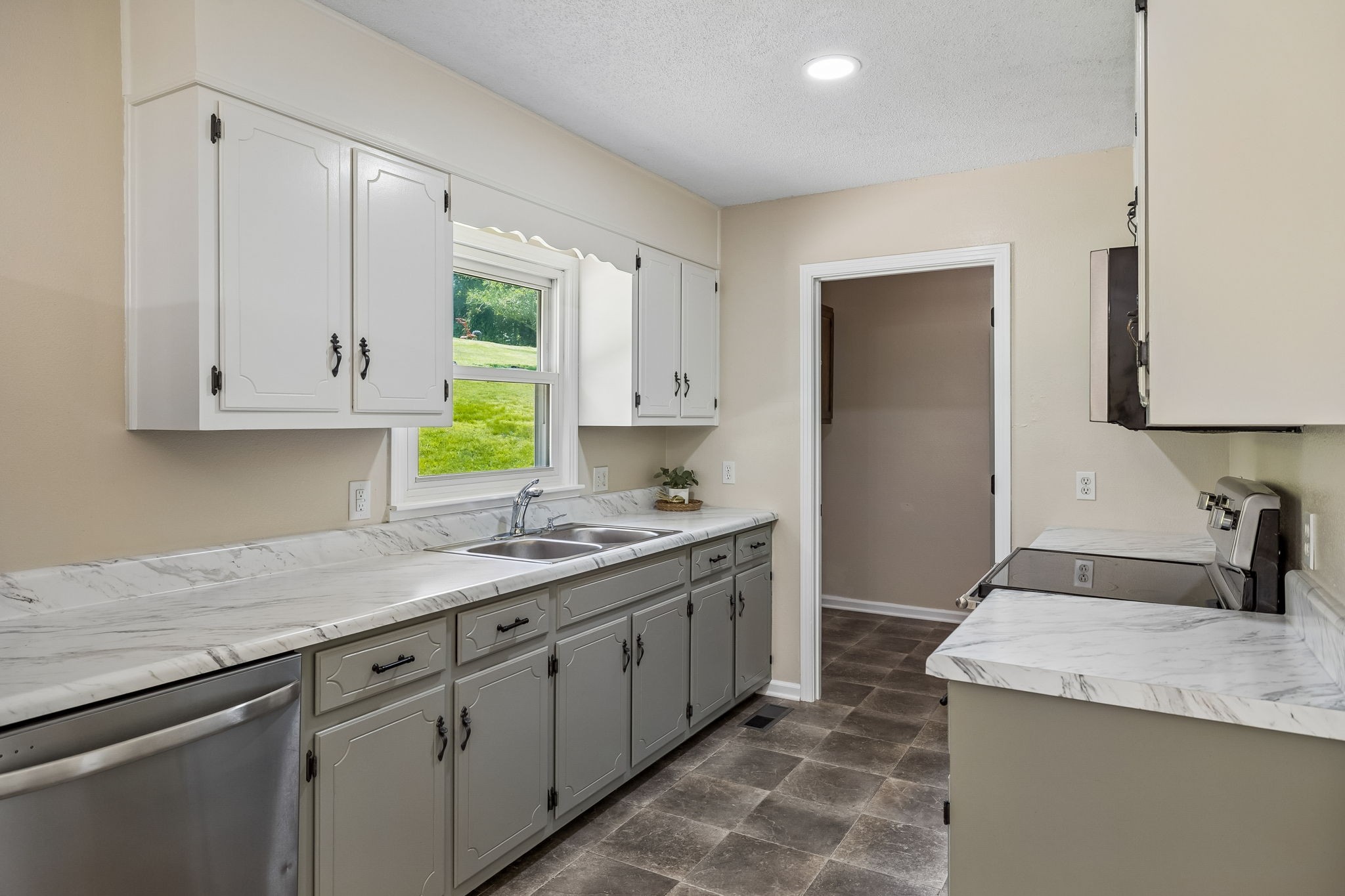 14 Morris Lane Carthage, TN 37030 - Photo 20 of 31 a kitchen with granite countertop cabinets and window