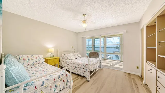 a bathroom with a sink a toilet and shower curtain