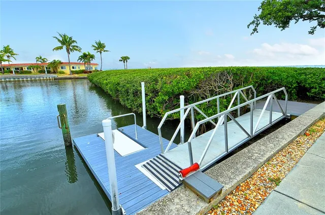 a view of a swimming pool with a lounge chairs