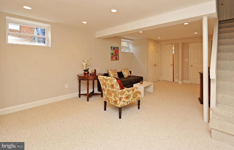 716 West Glebe Road Alexandria, VA 22305 - Photo 12 of 27 a living room with furniture and wooden floor
