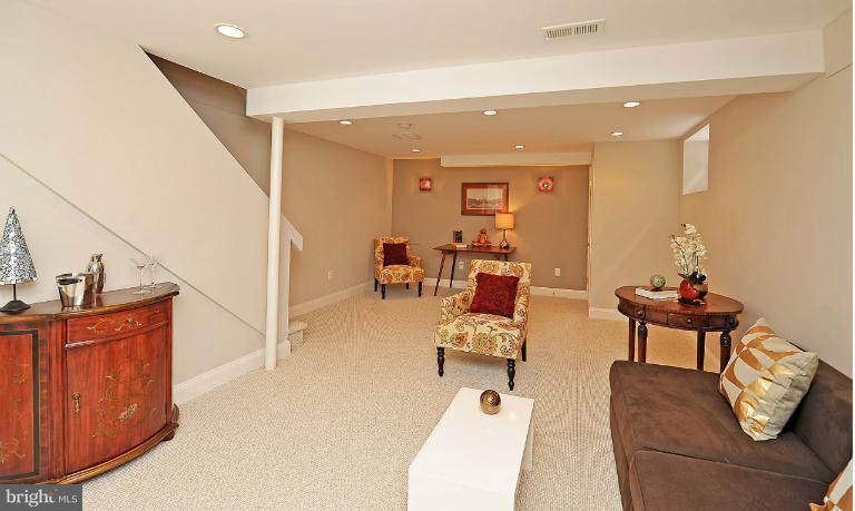 716 West Glebe Road Alexandria, VA 22305 - Photo 15 of 27 a living room with furniture and a wooden floor