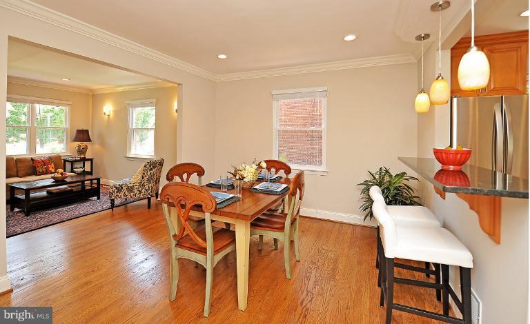716 West Glebe Road Alexandria, VA 22305 - Photo 5 of 27 a view of a dining room with furniture and wooden floor