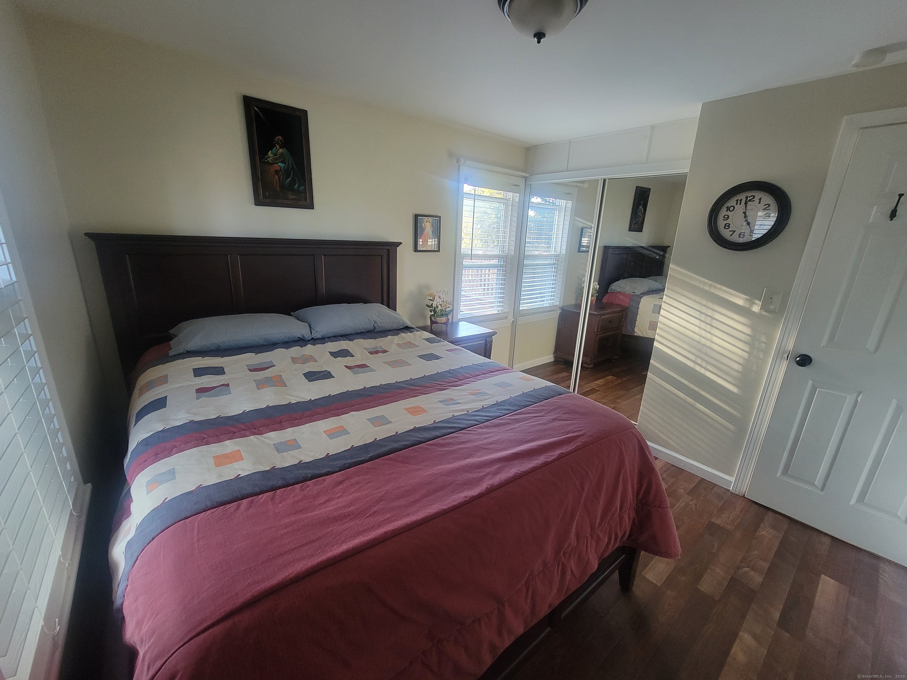 336 Circular Avenue Hamden, CT 06514 - Photo 13 of 21 a bedroom with a bed and a window