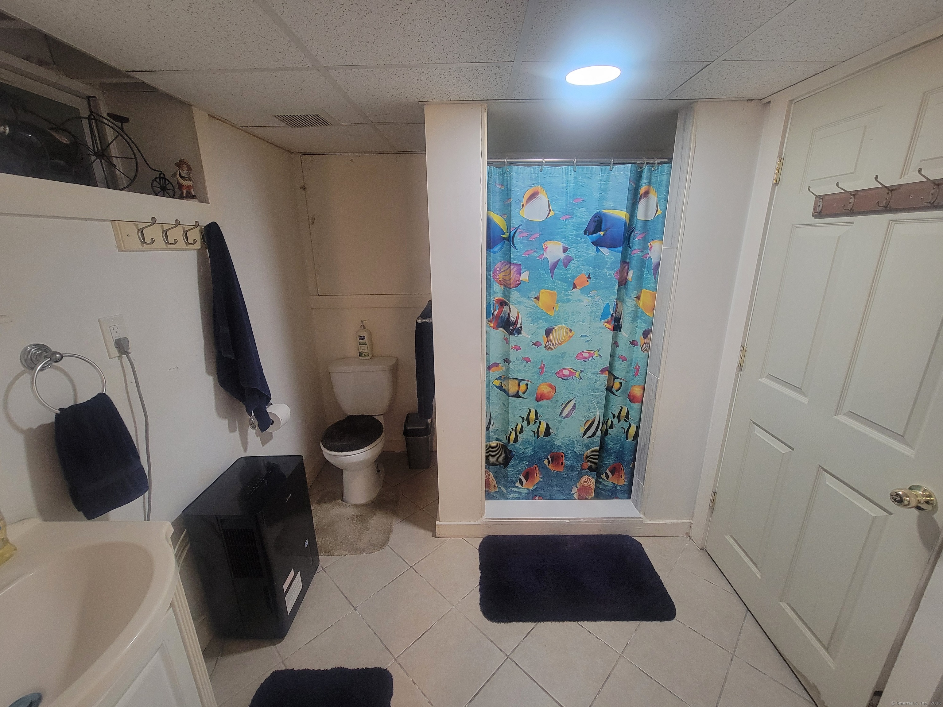 336 Circular Avenue Hamden, CT 06514 - Photo 16 of 21 a bathroom with a bathtub and toilet
