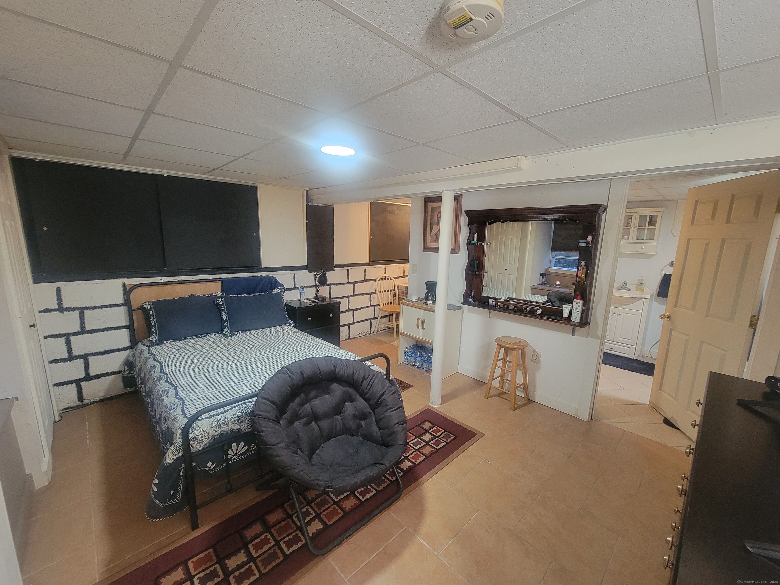 336 Circular Avenue Hamden, CT 06514 - Photo 18 of 21 a living room with furniture and a flat screen tv