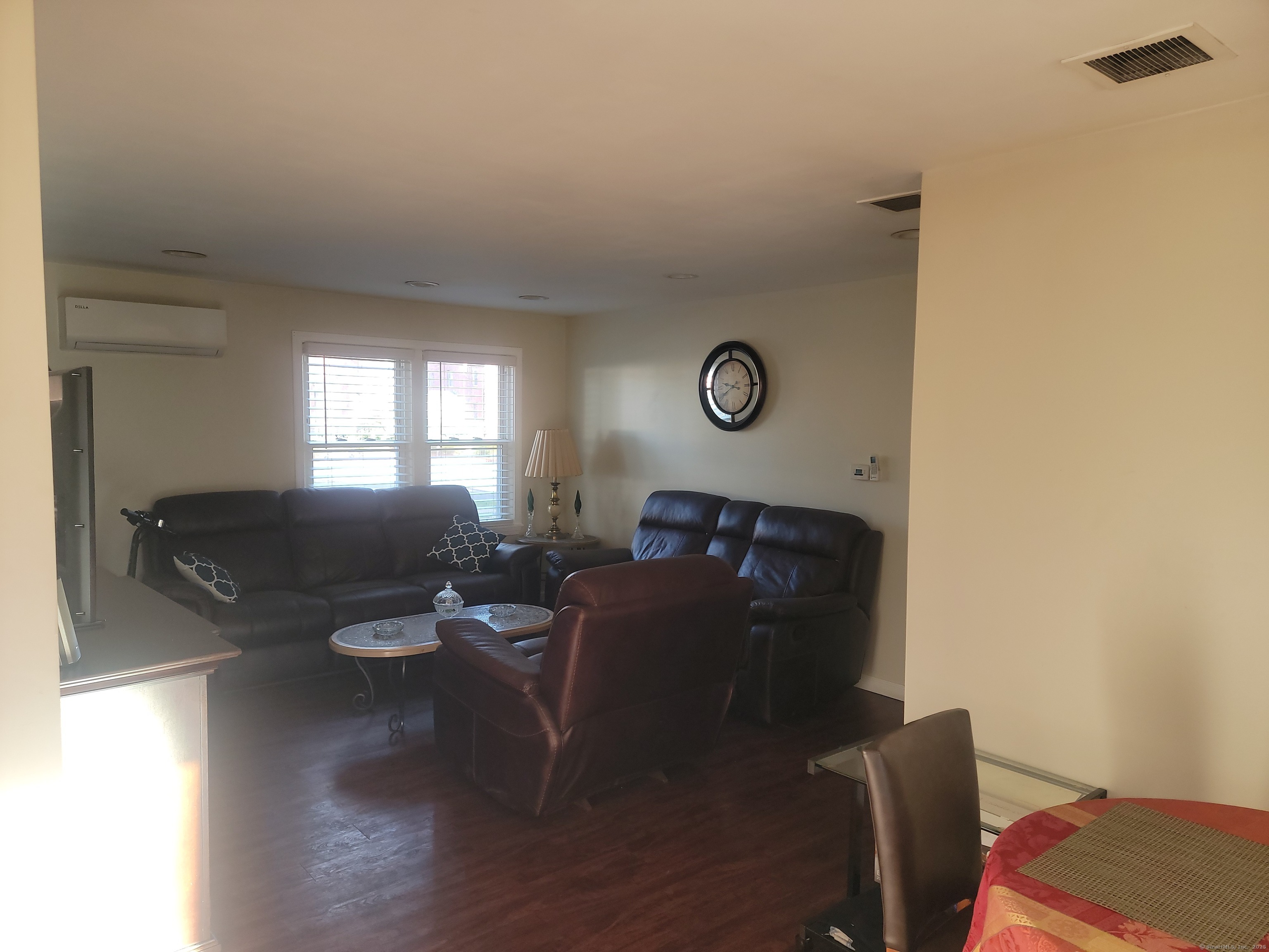 336 Circular Avenue Hamden, CT 06514 - Photo 5 of 21 a living room with couches chairs and a coffee table