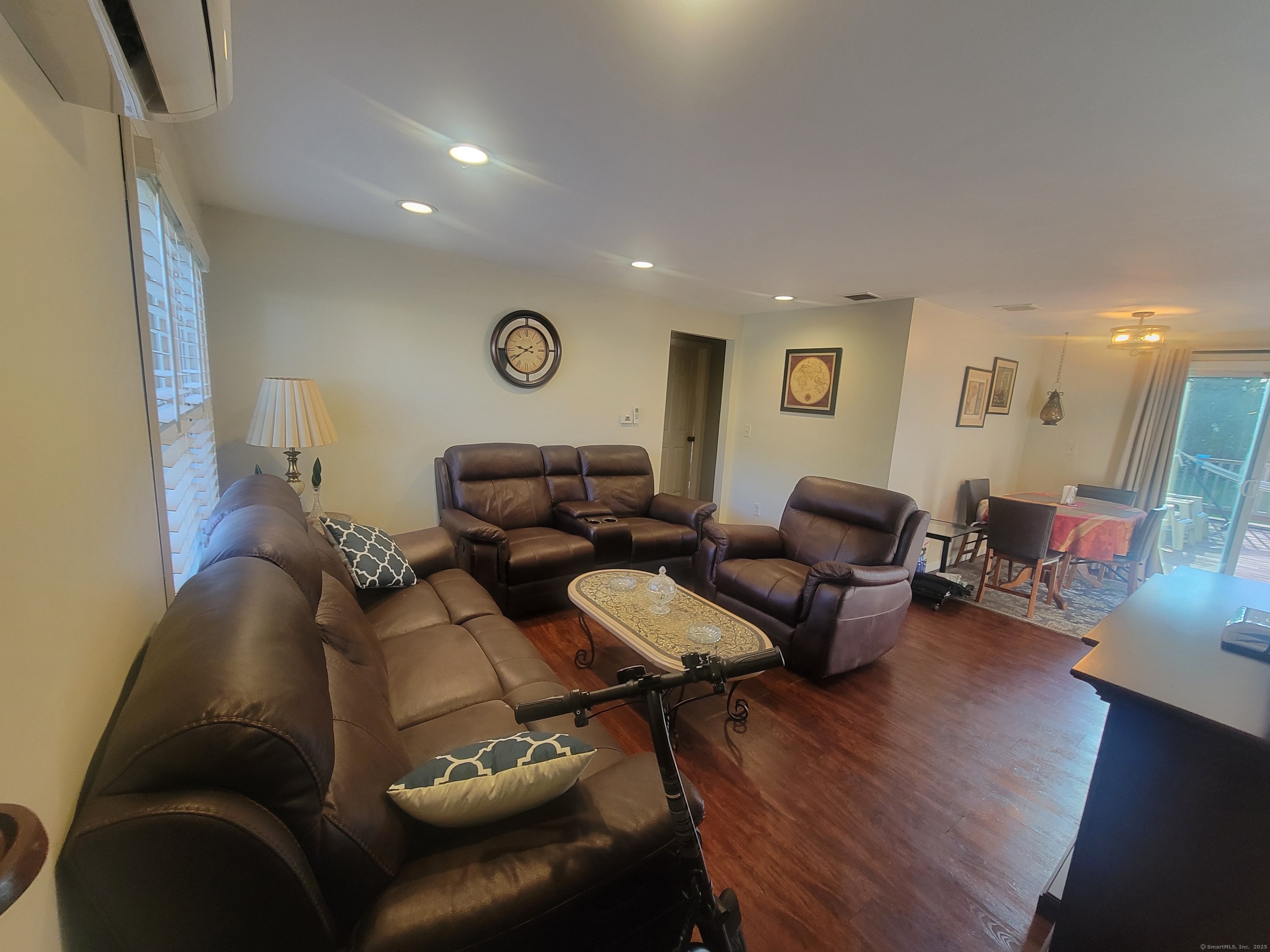 336 Circular Avenue Hamden, CT 06514 - Photo 6 of 21 a living room with furniture and wooden floor