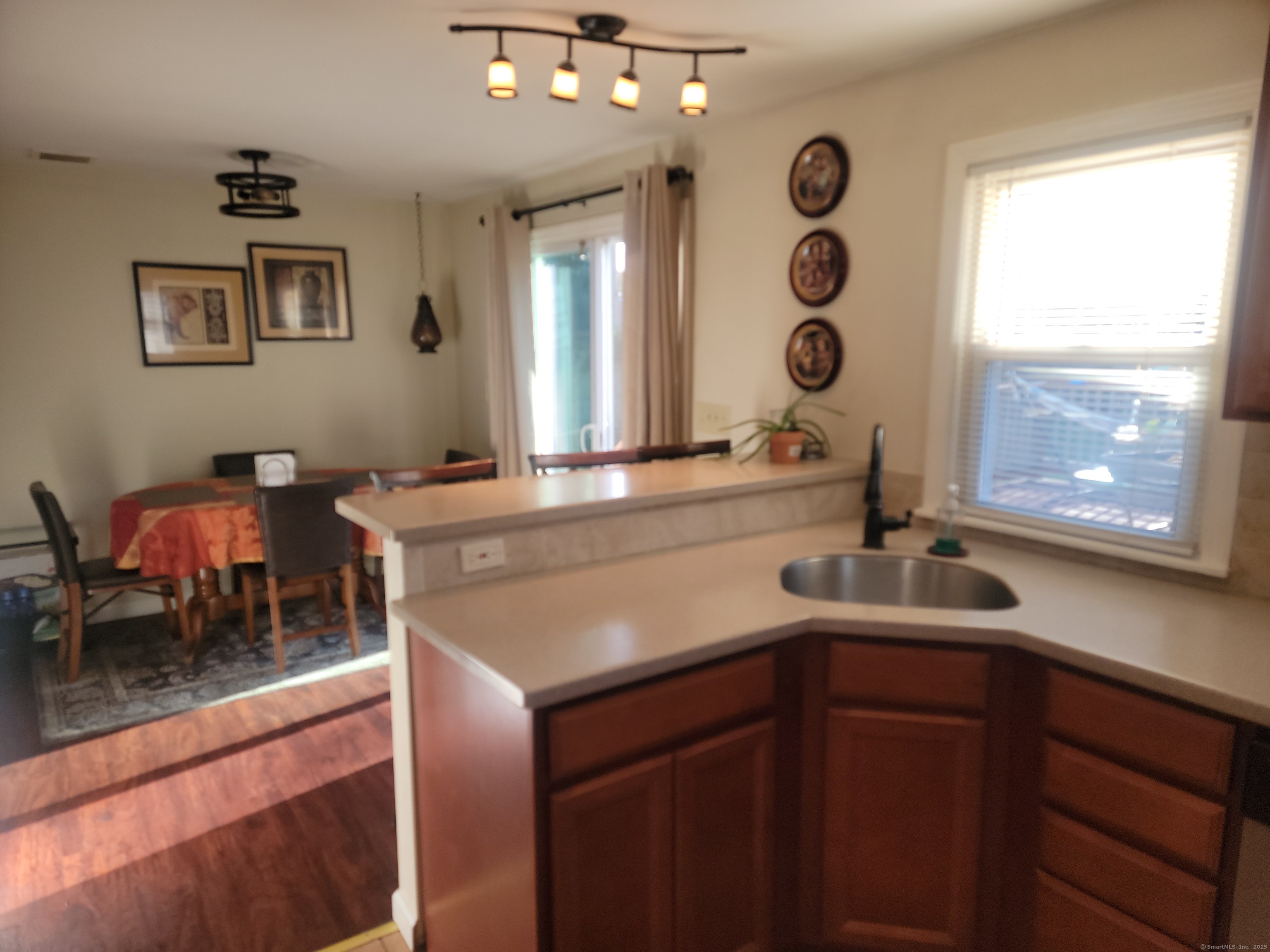336 Circular Avenue Hamden, CT 06514 - Photo 9 of 21 a kitchen with a sink and a window