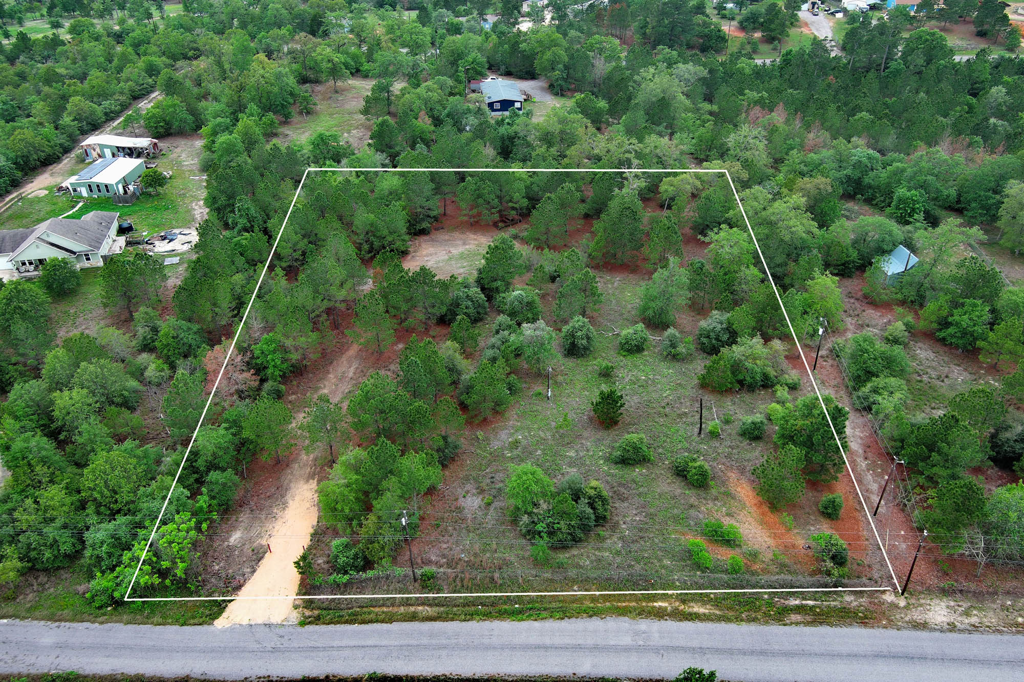 172 Kelley Road East Bastrop, TX 78602 - Photo 18 of 26 a view of a yard