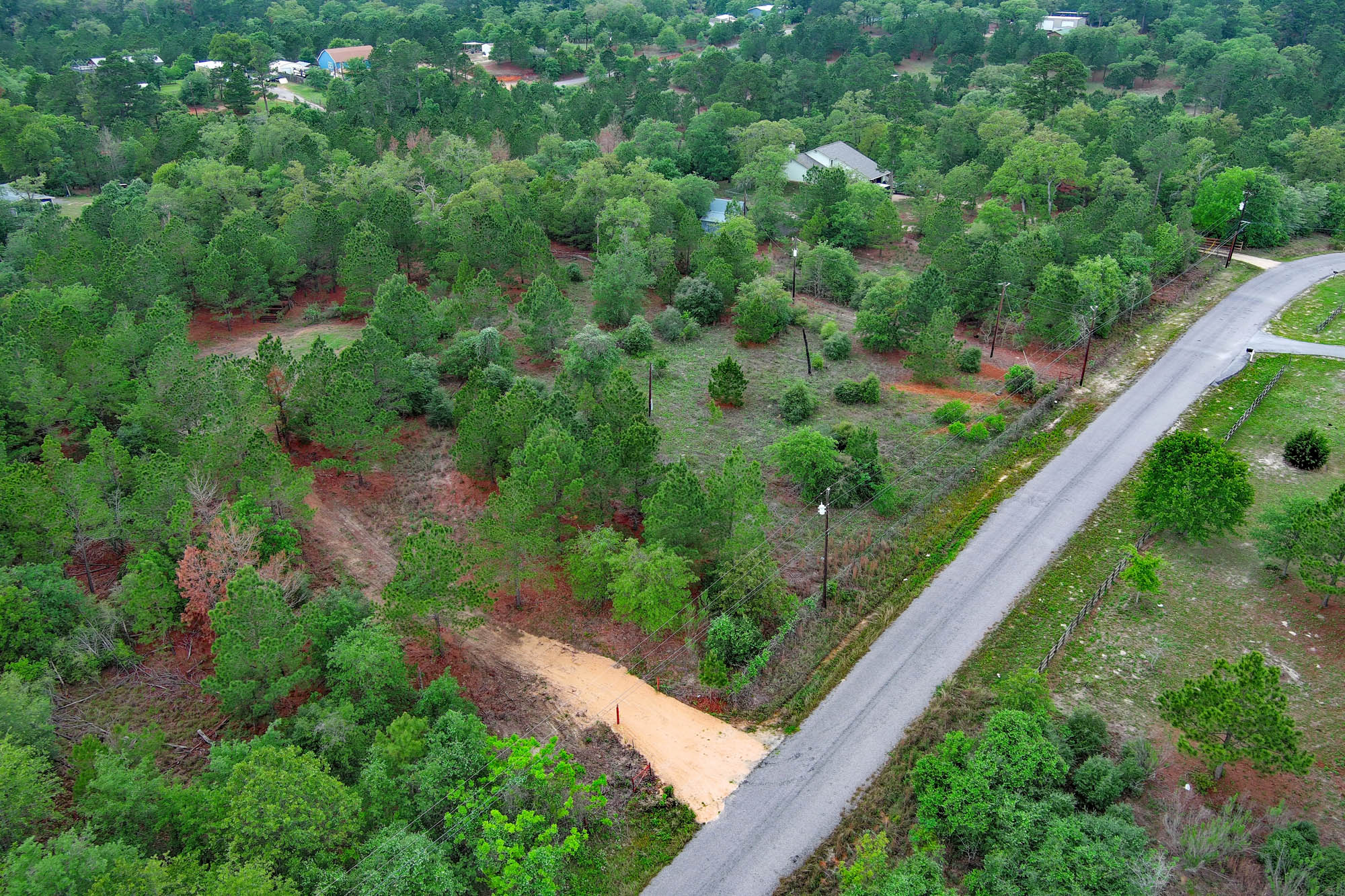 172 Kelley Road East Bastrop, TX 78602 - Photo 2 of 26 a view of a garden from a balcony