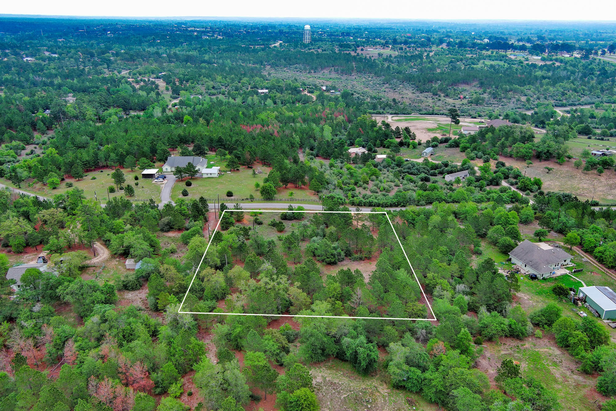 172 Kelley Road East Bastrop, TX 78602 - Photo 22 of 26 an aerial view of a house with a yard