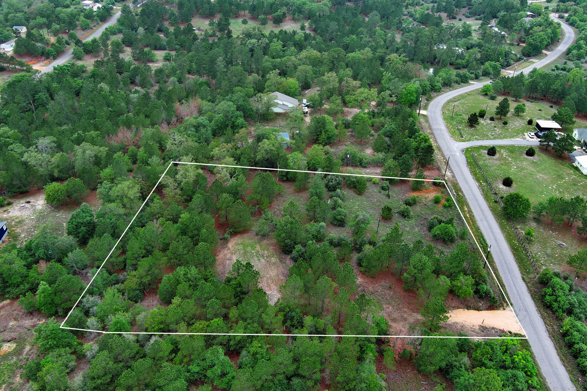 172 Kelley Road East Bastrop, TX 78602 - Photo 24 of 26 an aerial view of houses with yard
