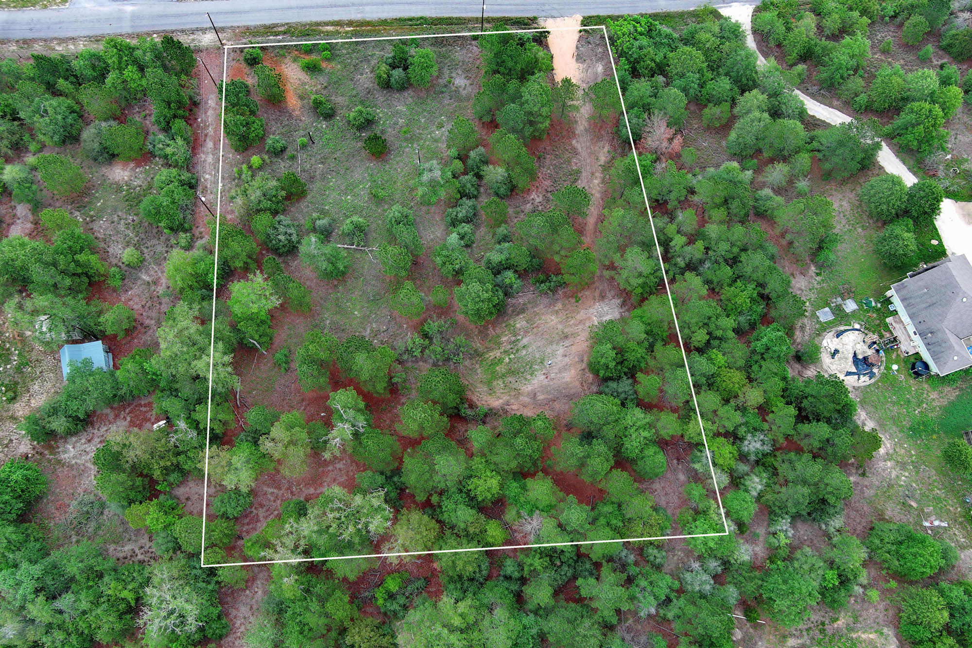 172 Kelley Road East Bastrop, TX 78602 - Photo 26 of 26 an aerial view of a house with a yard