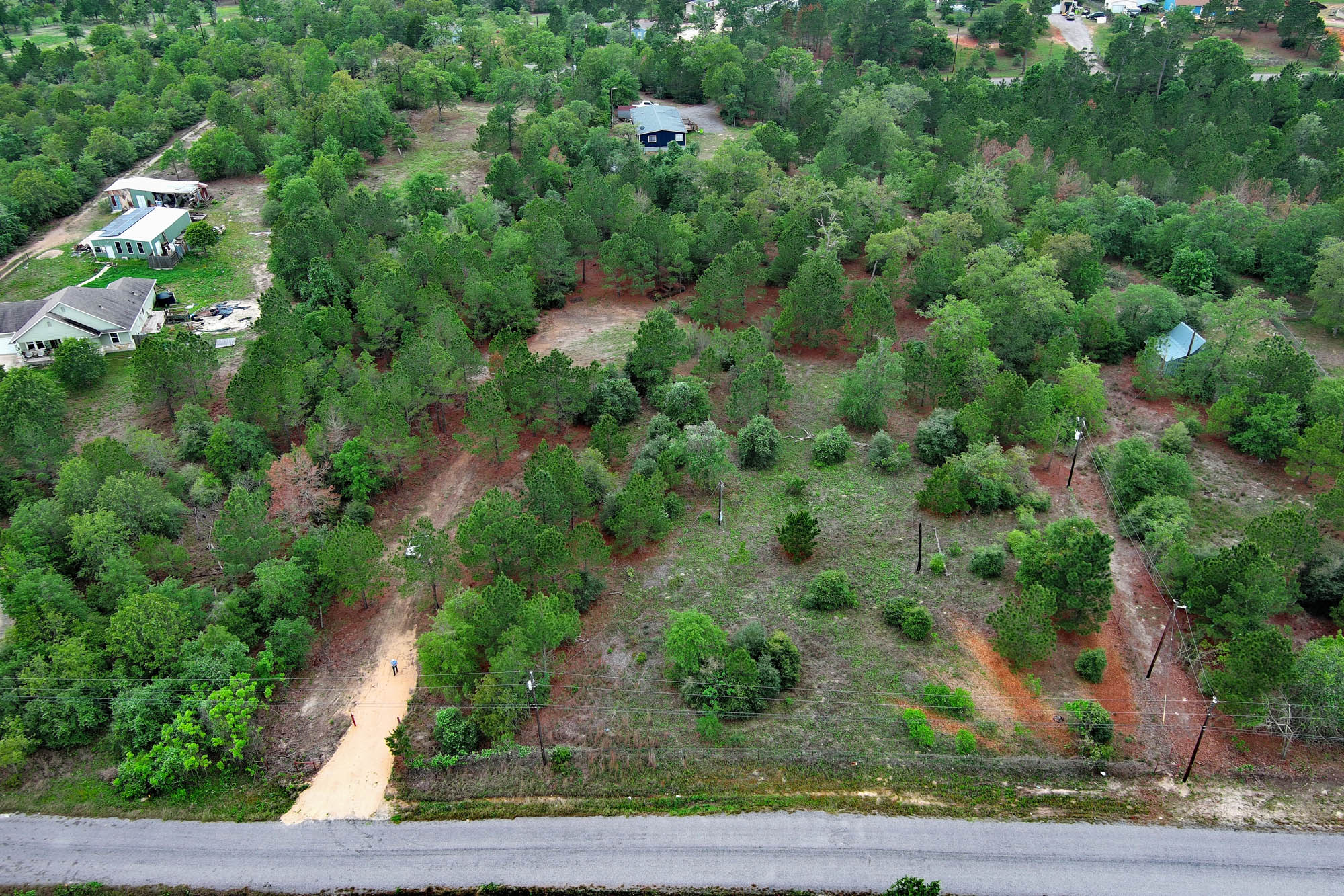 172 Kelley Road East Bastrop, TX 78602 - Photo 3 of 26 an aerial view of a house with a yard