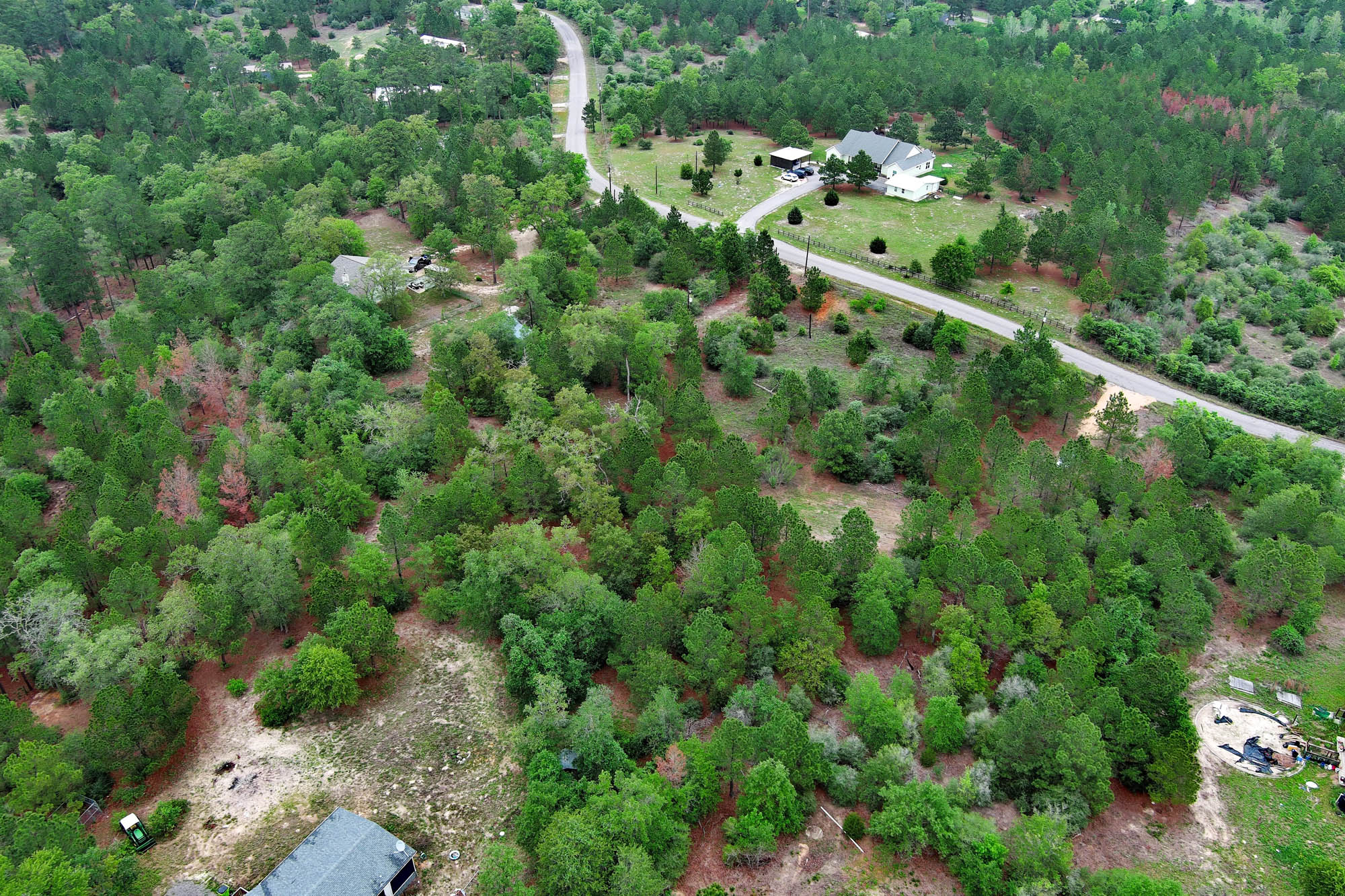 172 Kelley Road East Bastrop, TX 78602 - Photo 8 of 26 an aerial view of a houses with a yard