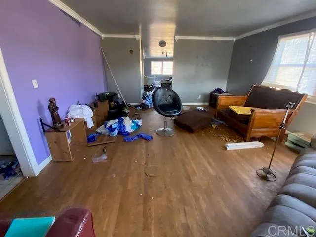 a room with furniture and a window