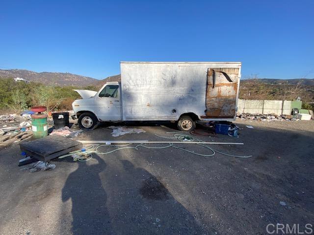 5676 Dehesa Road El Cajon, CA 92019 - Photo 21 of 23 a view of a car in front of a building