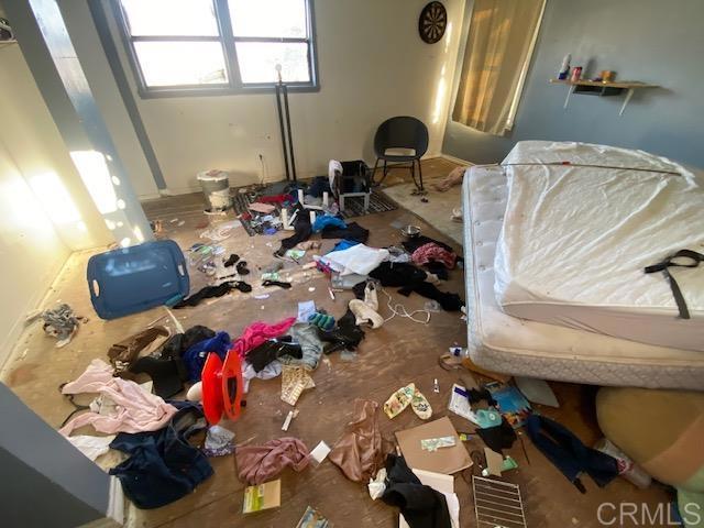 5676 Dehesa Road El Cajon, CA 92019 - Photo 6 of 23 a view of a workspace with furniture and floor to ceiling window