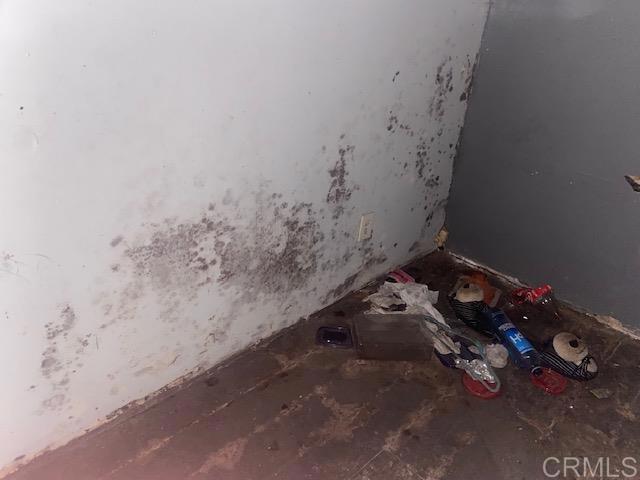 5676 Dehesa Road El Cajon, CA 92019 - Photo 8 of 23 a room with water heater and covered in the back