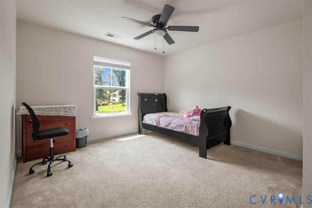 9013 Bailey Hill Road Midlothian, VA 23112 - Photo 44 of 56 Carpeted room with a ceiling fan, a single window