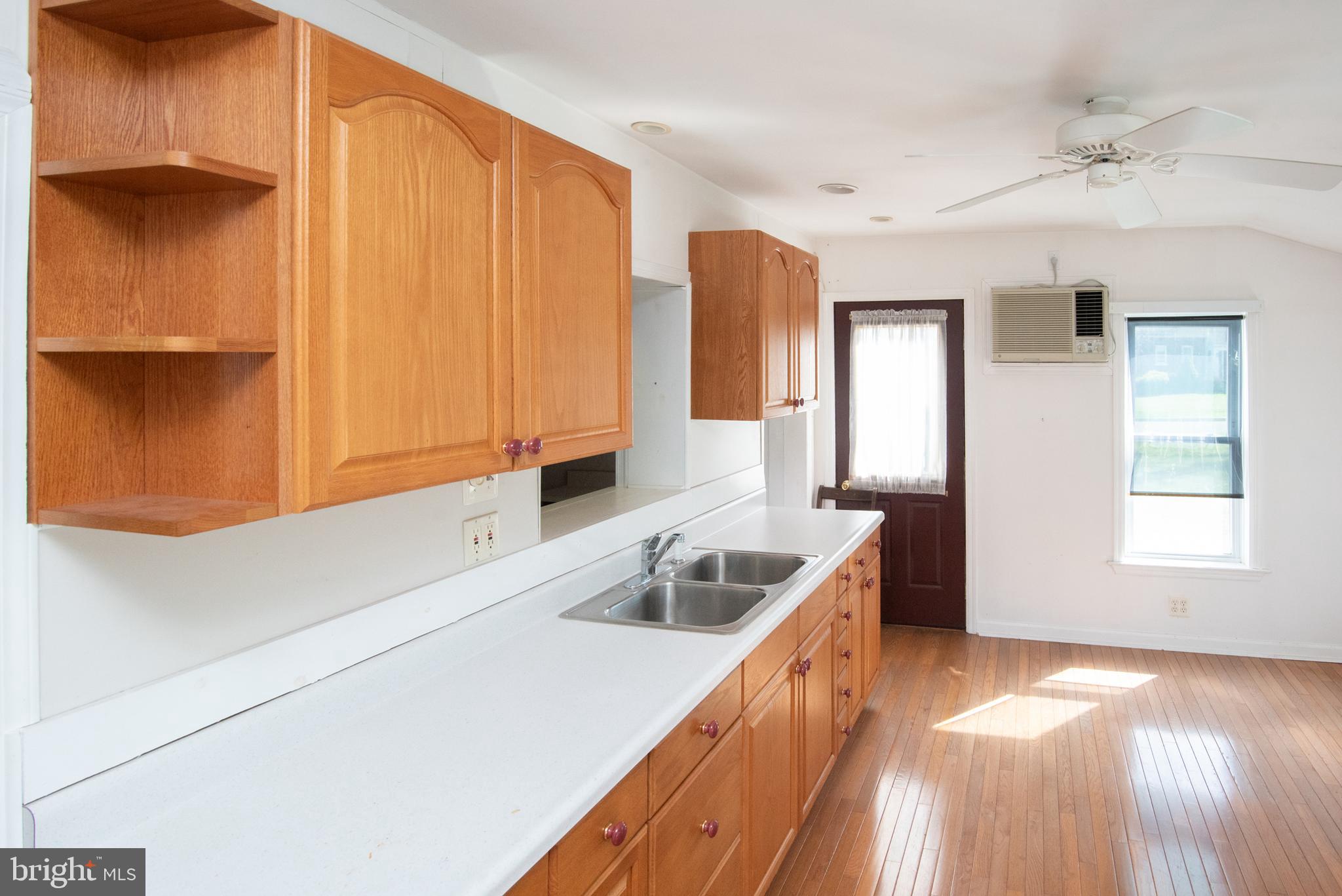 800 Forrest Street Lansdale, PA 19446 - Photo 12 of 42 a kitchen that has a sink and a stove