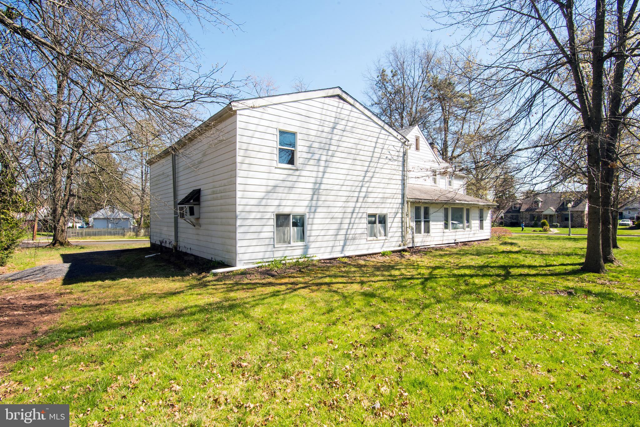 800 Forrest Street Lansdale, PA 19446 - Photo 4 of 42 a view of a house with a yard patio and fire pit
