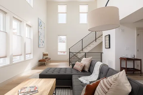 a living room with furniture and a couch