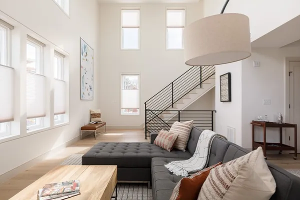 a living room with furniture and a couch