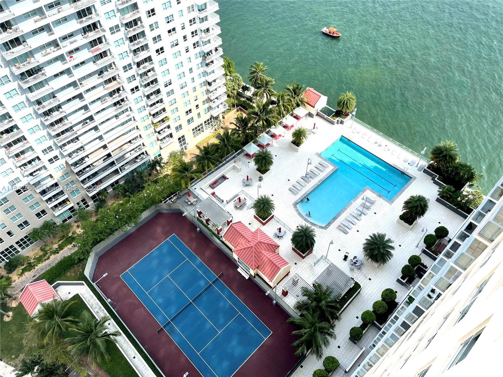 1155 Brickell Bay Drive, Unit 2802 Miami, FL 33131 - Photo 37 of 43 a view of balcony with yard