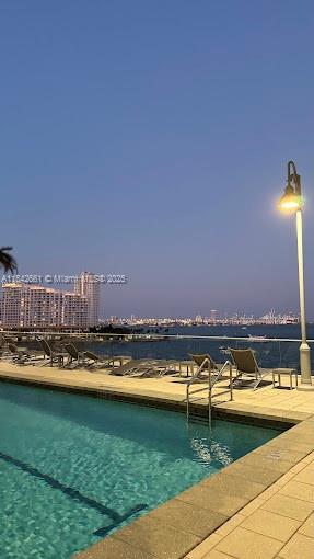 1155 Brickell Bay Drive, Unit 2802 Miami, FL 33131 - Photo 39 of 43 a view of a lake with houses