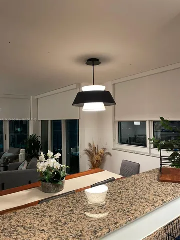 a view of a living room and dining room