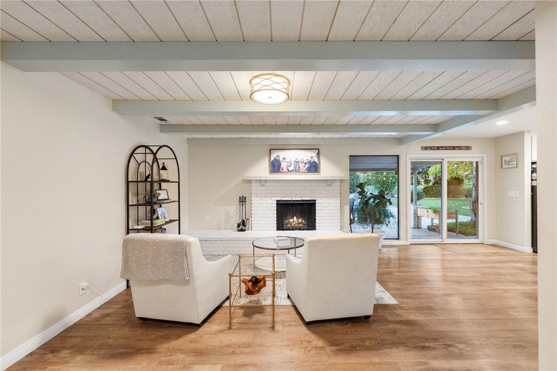 26440 Old Agency Road Hemet, CA 92544 - Photo 21 of 74 a living room with furniture and a fireplace