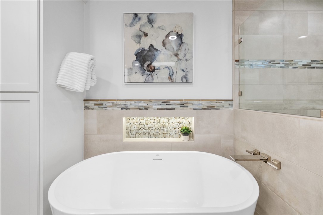 26440 Old Agency Road Hemet, CA 92544 - Photo 35 of 74 a white bath tub sitting next to a white wall