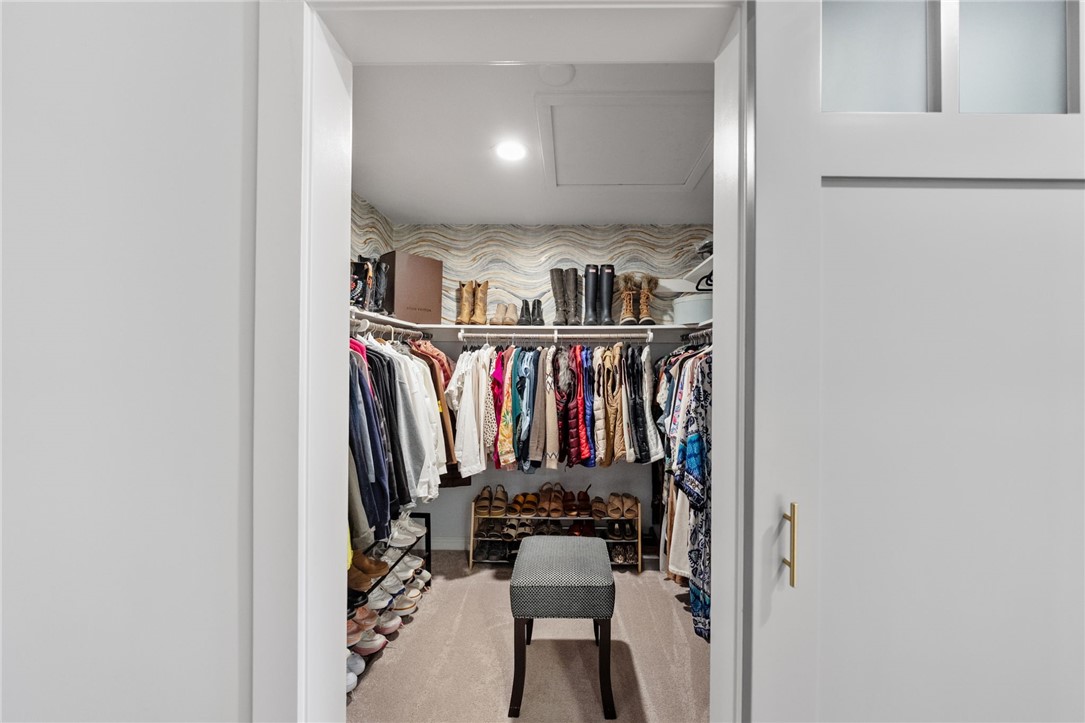 26440 Old Agency Road Hemet, CA 92544 - Photo 36 of 74 a view of walk in closet with clothes and shoes