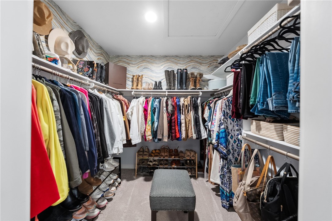 26440 Old Agency Road Hemet, CA 92544 - Photo 37 of 74 a view of walk in closet with clothes