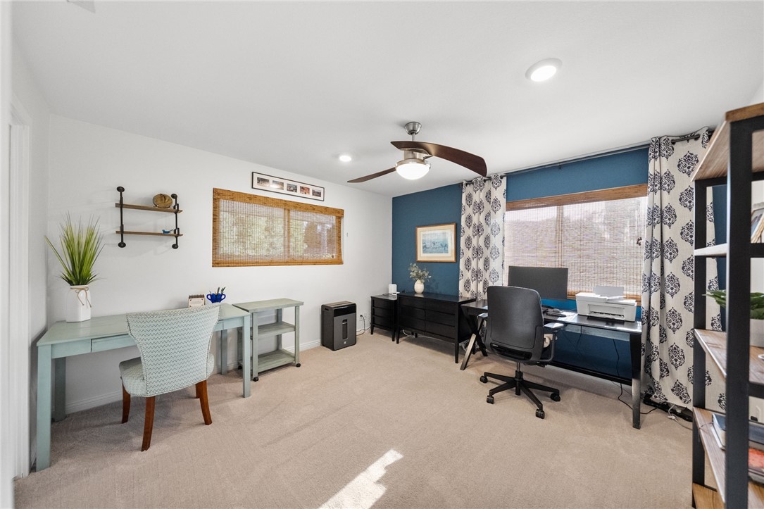 26440 Old Agency Road Hemet, CA 92544 - Photo 40 of 74 a view of a livingroom with workspace and a window