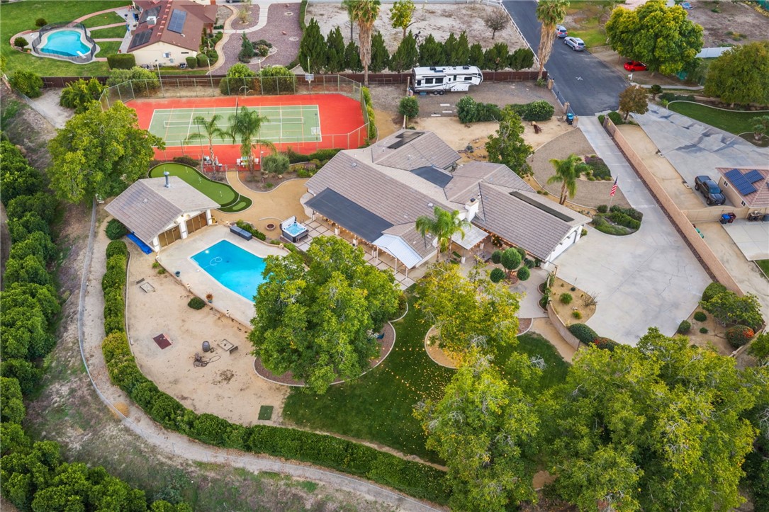 26440 Old Agency Road Hemet, CA 92544 - Photo 6 of 74 an aerial view of a house with a swimming pool yard and outdoor seating