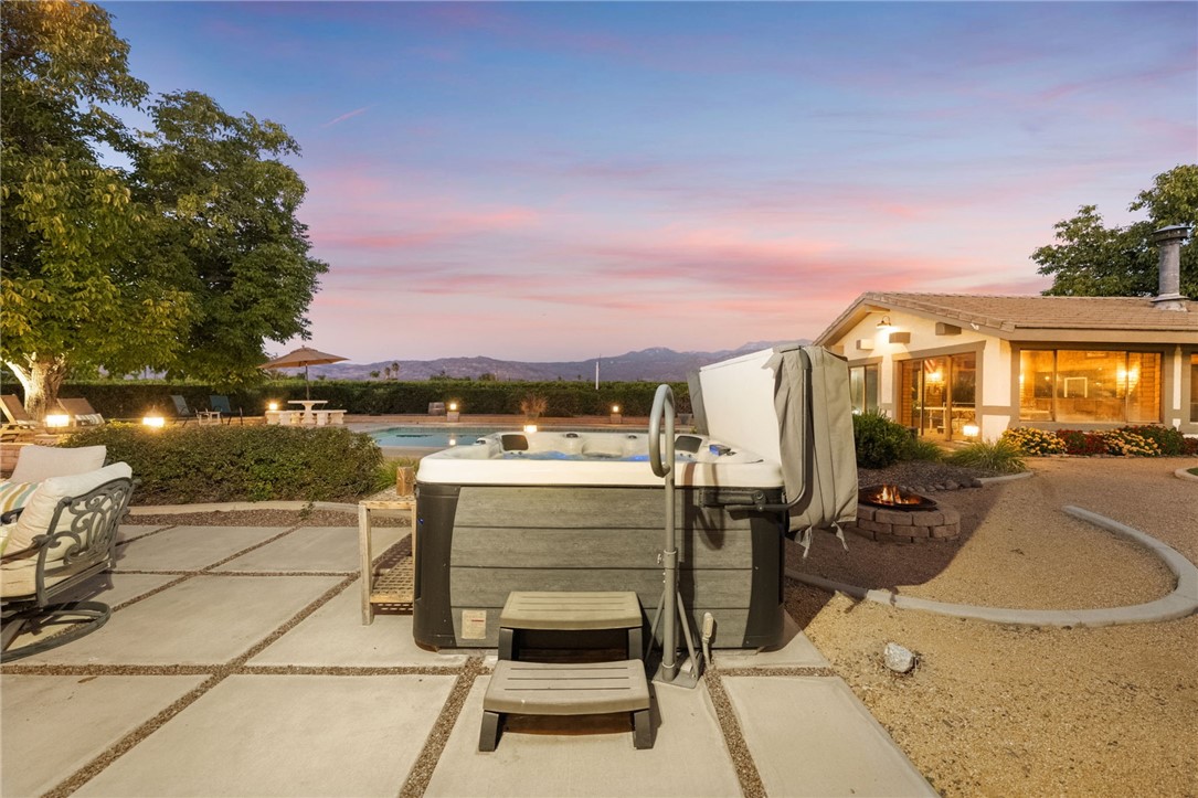 26440 Old Agency Road Hemet, CA 92544 - Photo 64 of 74 a view of a patio with swimming pool table and chairs