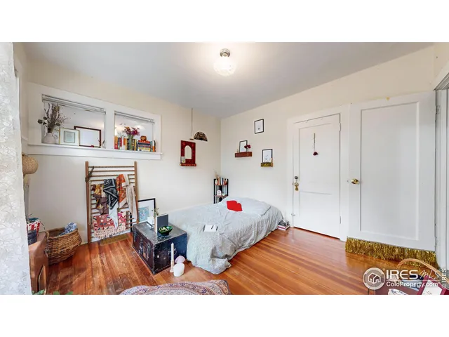 a kitchen with stainless steel appliances kitchen island granite countertop a sink and a refrigerator