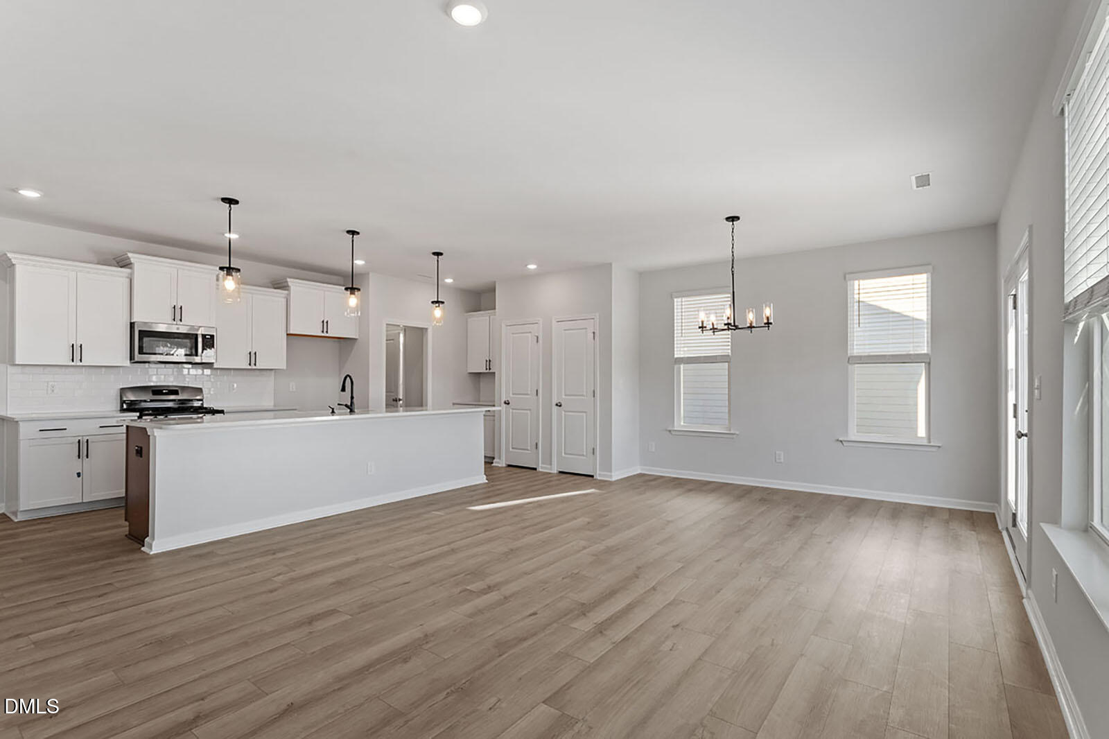 931 Westerland Way, Unit 74 Durham, NC 27703 - Photo 12 of 33 a view of kitchen with wooden floor and window