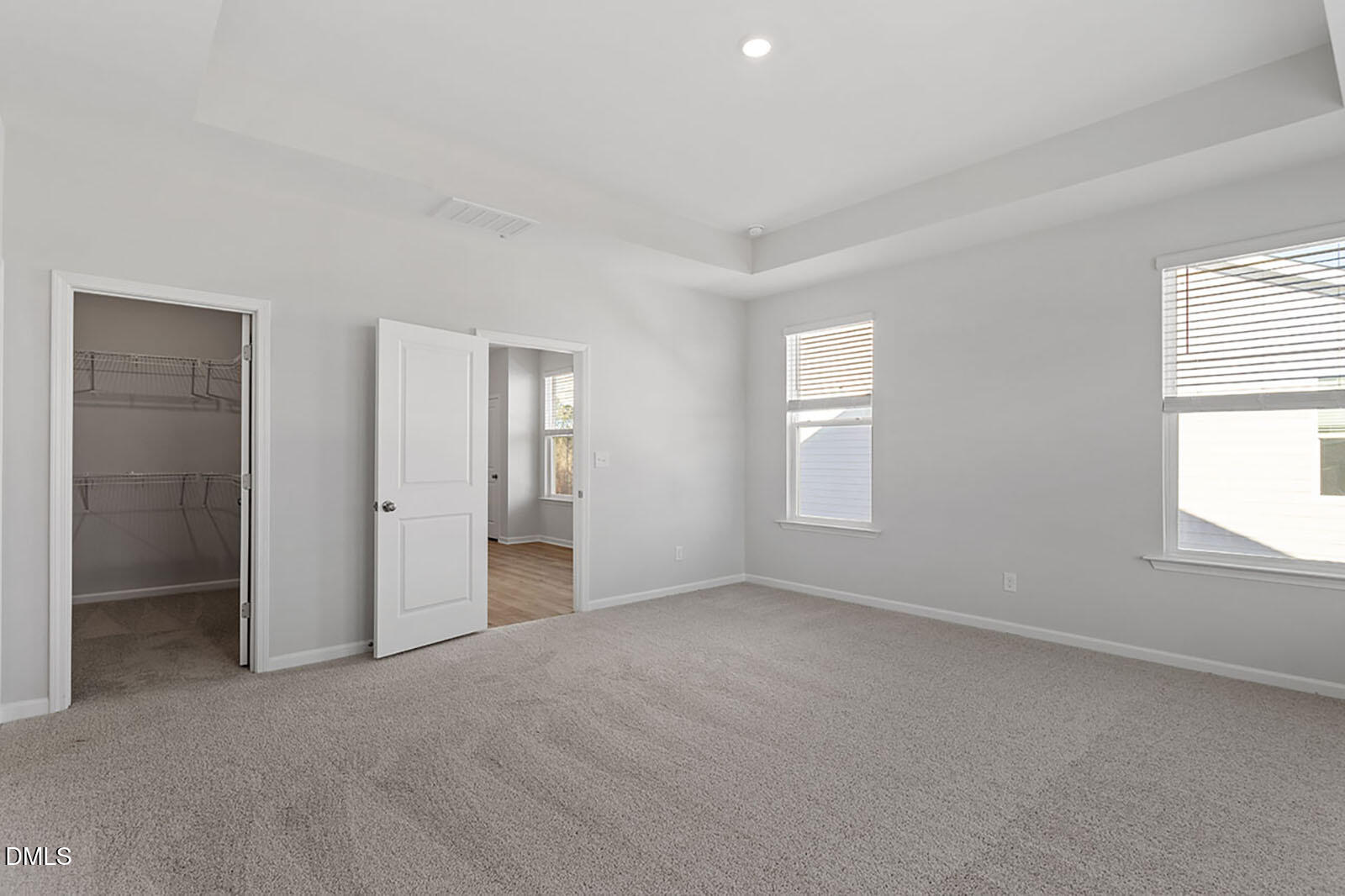 931 Westerland Way, Unit 74 Durham, NC 27703 - Photo 17 of 33 an empty room with windows and closet