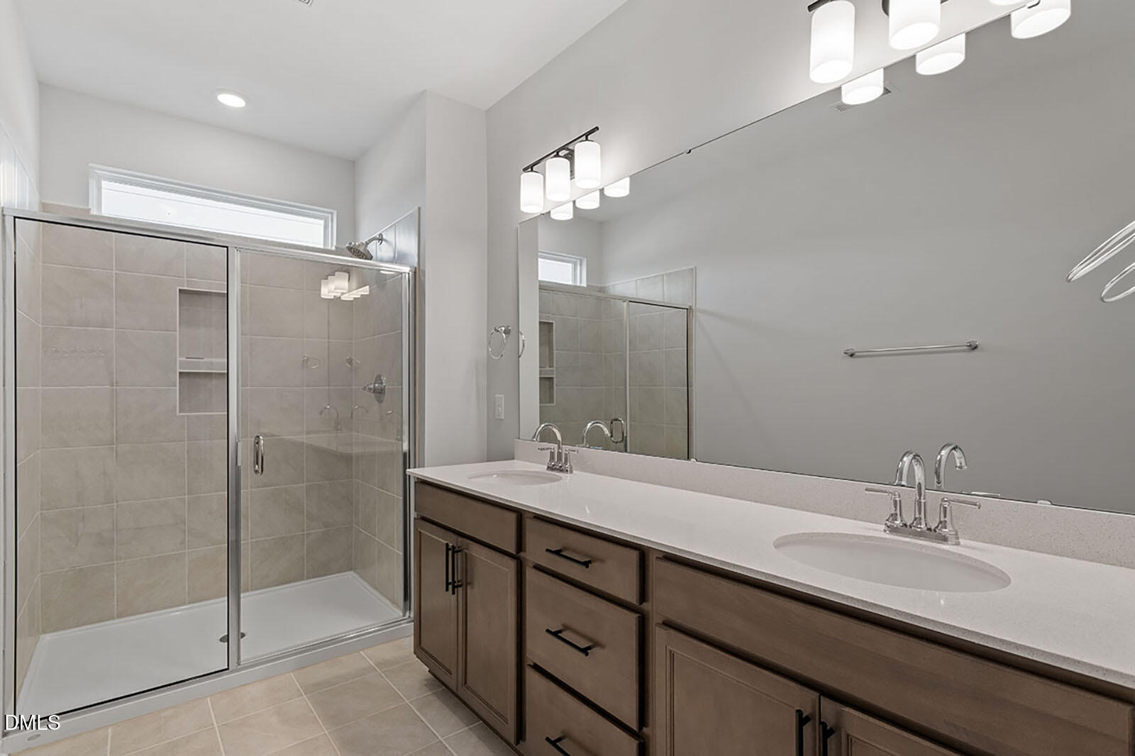 931 Westerland Way, Unit 74 Durham, NC 27703 - Photo 19 of 33 a bathroom with a double vanity sink mirror and shower