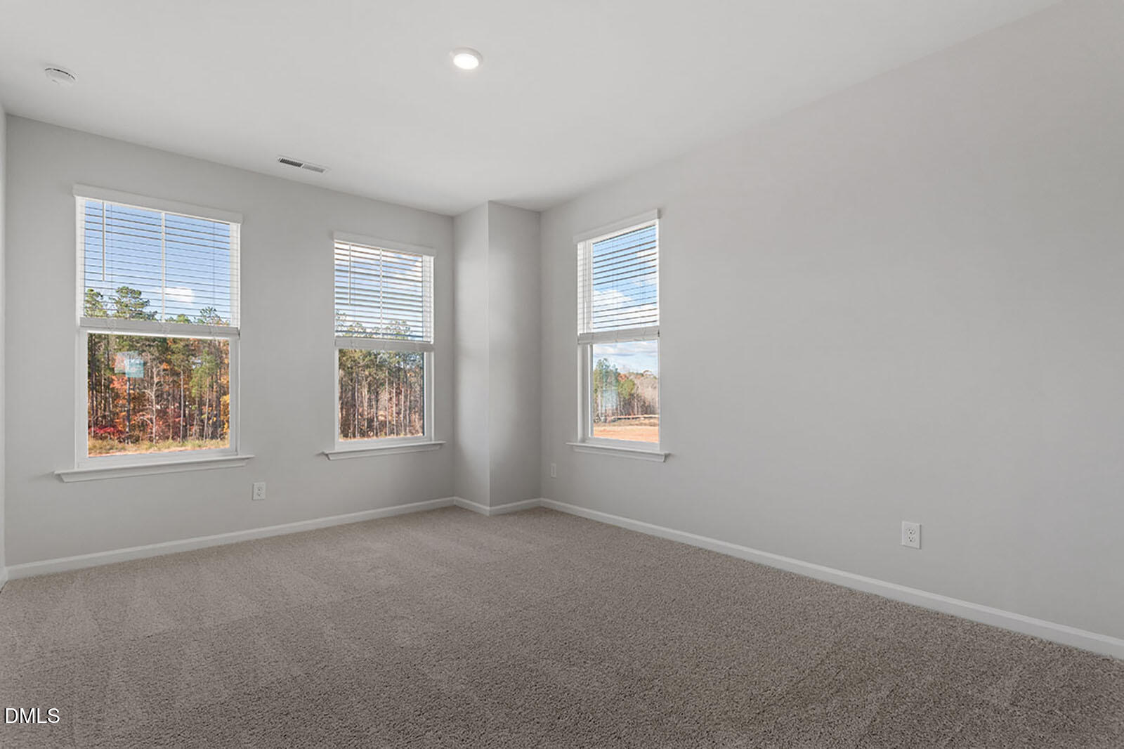 931 Westerland Way, Unit 74 Durham, NC 27703 - Photo 20 of 33 an empty room with windows