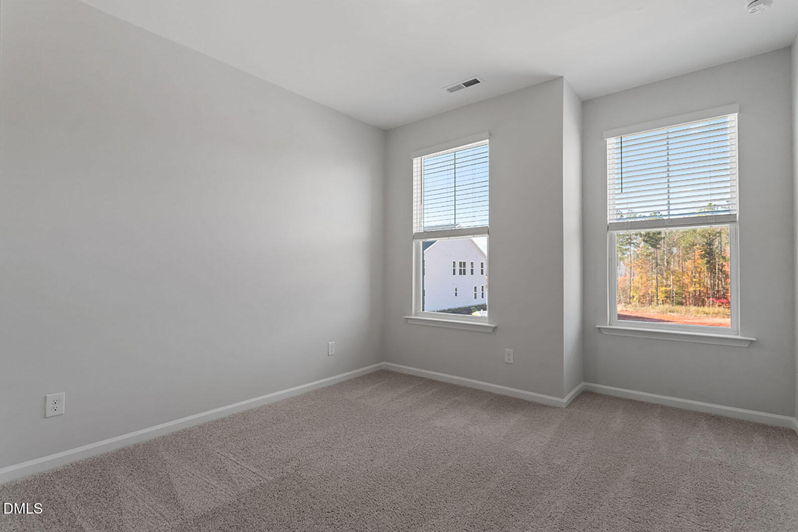931 Westerland Way, Unit 74 Durham, NC 27703 - Photo 22 of 33 an empty room with windows
