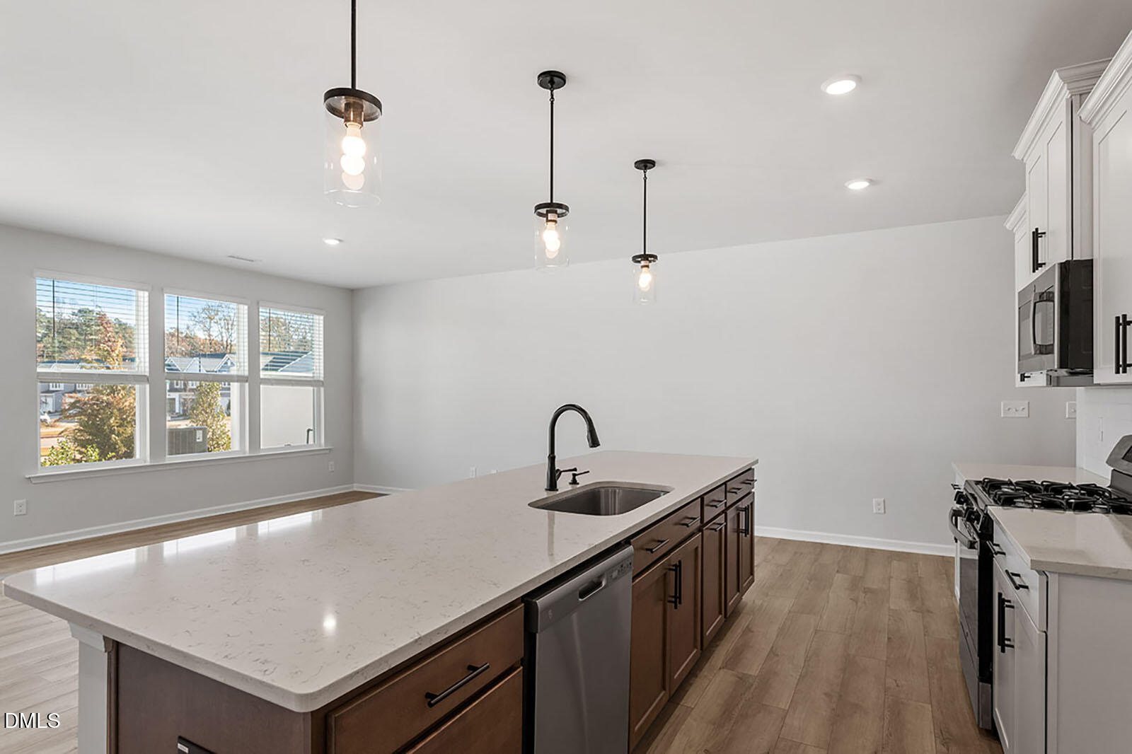 931 Westerland Way, Unit 74 Durham, NC 27703 - Photo 7 of 33 a kitchen with sink cabinets and window