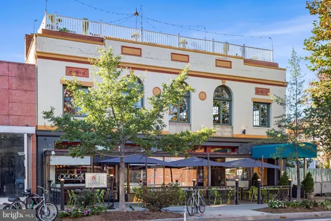 a view of a building with a street