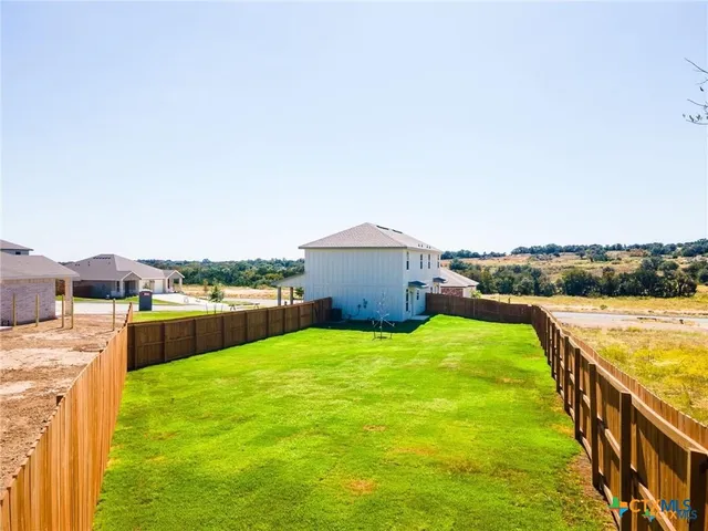 a view of swimming pool with an ocean view