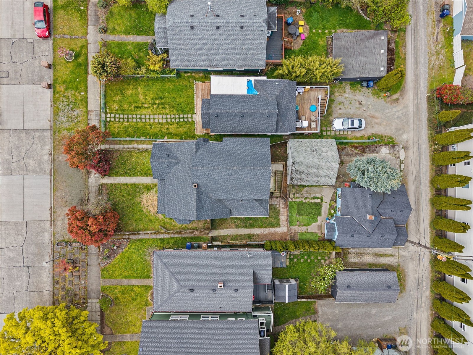 409 South 30th Street Tacoma, WA 98402 - Photo 1 of 37 an aerial view of residential houses with outdoor space