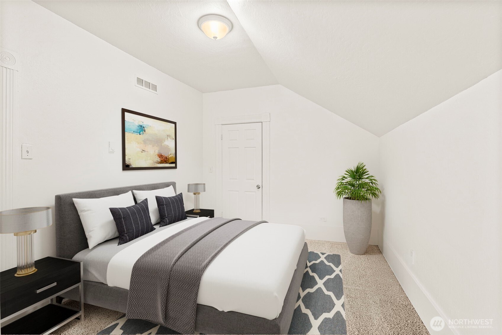409 South 30th Street Tacoma, WA 98402 - Photo 30 of 37 a bedroom with bed and a potted plant